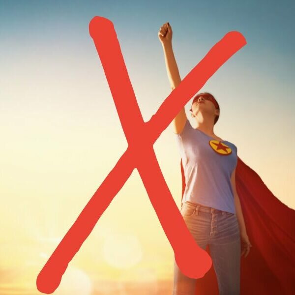 this is an image of a woman dressed as a superhero and there is a big red cross over the picture